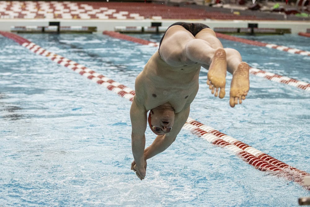 <p>Freshman Rafael Miroslaw dives into the pool during the men&#x27;s 400-yard freestyle relay against Purdue on Jan. 22, 2022, at the Counsilman Billingsley Aquatic Center. Miroslaw finishes the race in the lead to give Indiana the win in the men&#x27;s 400-yard freestyle relay Saturday.</p>