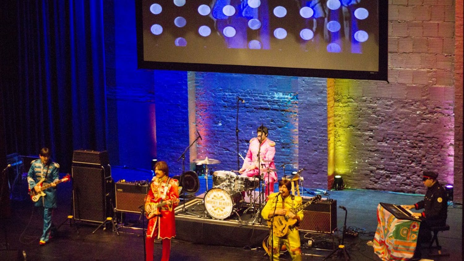The Mersey Beatles play their set Friday night at the Buskirk-Chumley Theater, which was packed for the tribute band's third performance in Bloomington. The Mersey Beatles performed "Sgt. Pepper’s Lonely Hearts Club Band," which celebrated its 50th anniversary this year. 