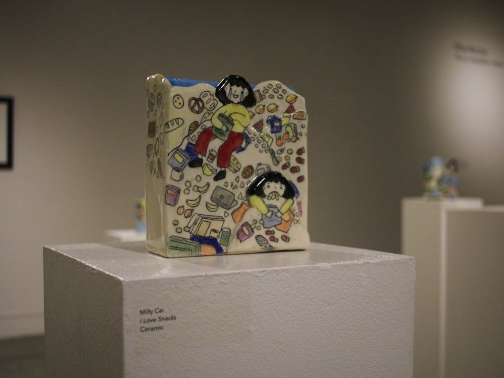 &quot;I Love Snacks&quot; is a collection of drawings imposed on the flat surfaces of ceramic works by IU Senior Milly Cai. The Grundwald Gallery will host MFA Thesis Exhibition II April 4-15, 2023. 