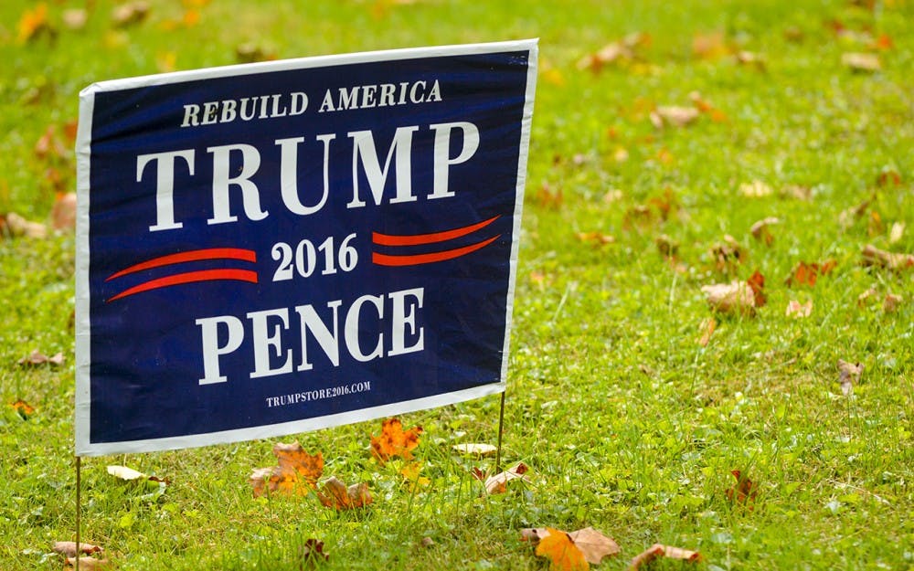A campaign sign in the yard of a Donald Trump supporter.