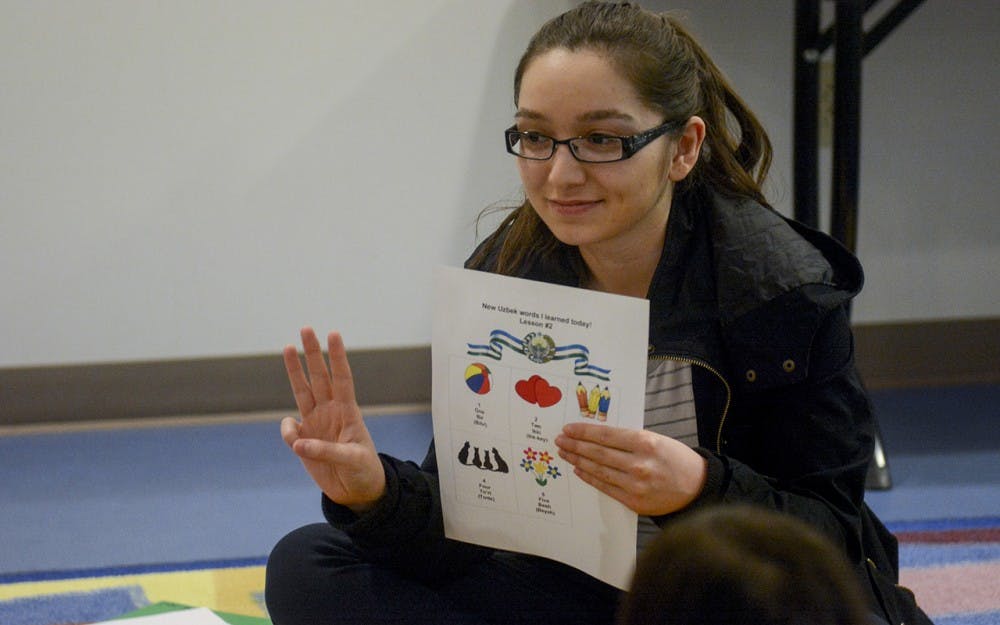 Madina Alimova, IU student, leads the introductory Uzbek world language and culture class for kids Monday evening at the Monroe County Public Library.
