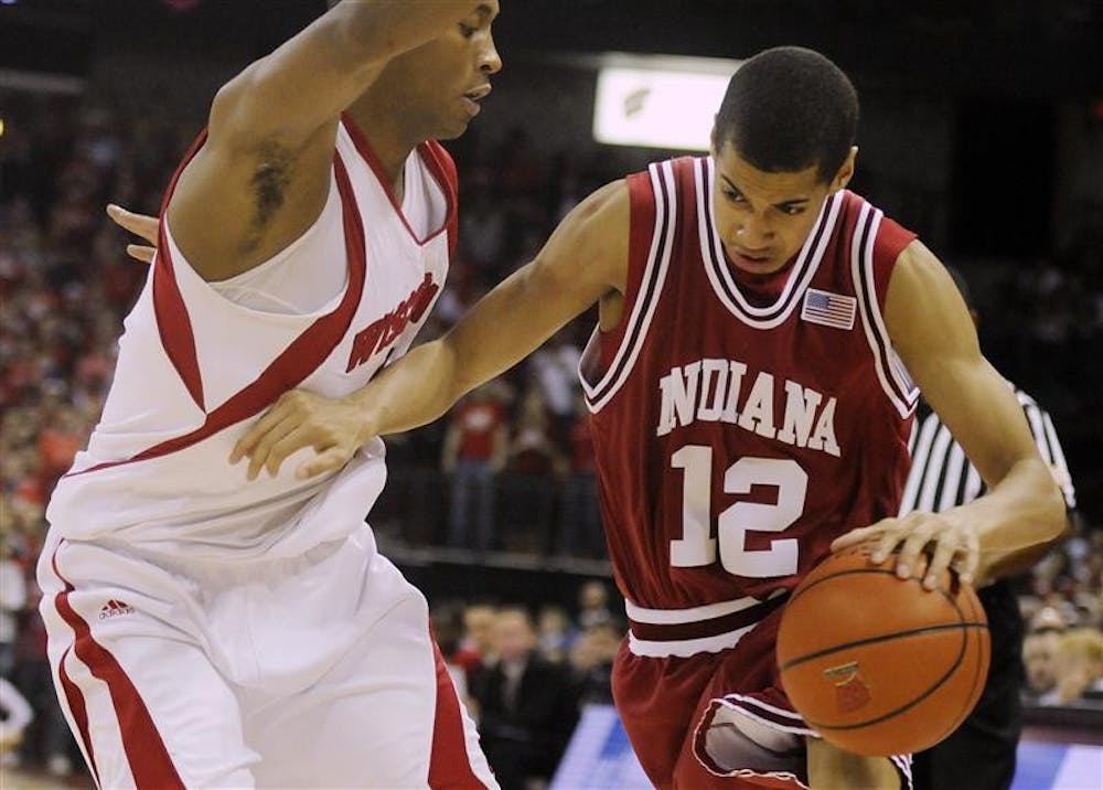 IU freshman guard Verdell Jones III drives on a Wisconsin defender during a game Sunday at the Kohl Center in Madison, Wis.