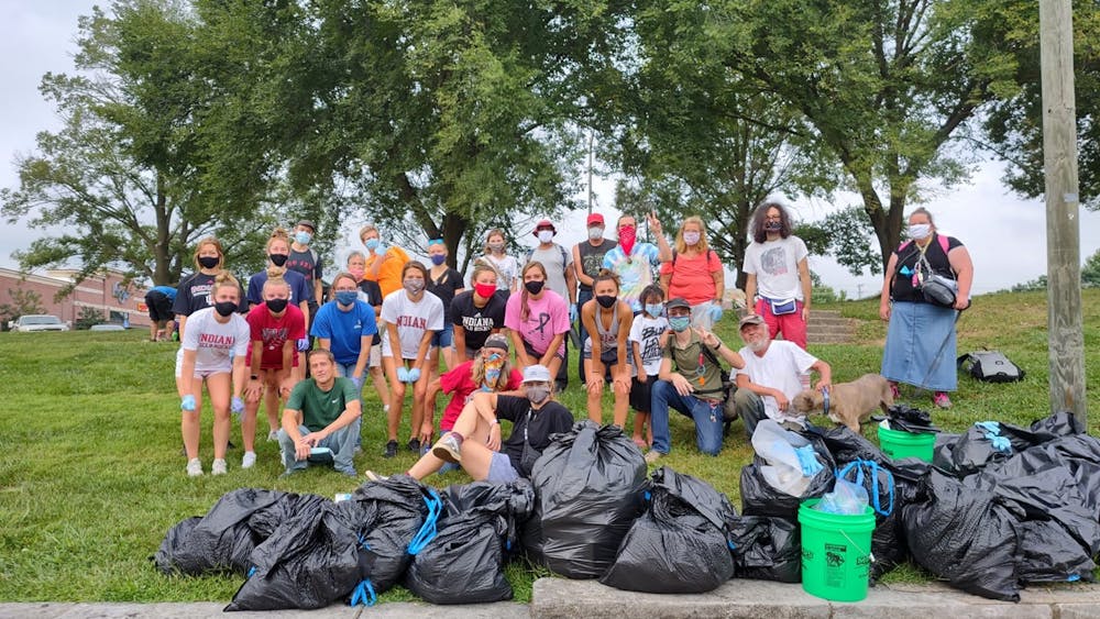 The Bloomington Homeless Coalition, with members of the IU Field Hockey and Soccer teams, gather Sept. 12 for its weekly community clean-up.