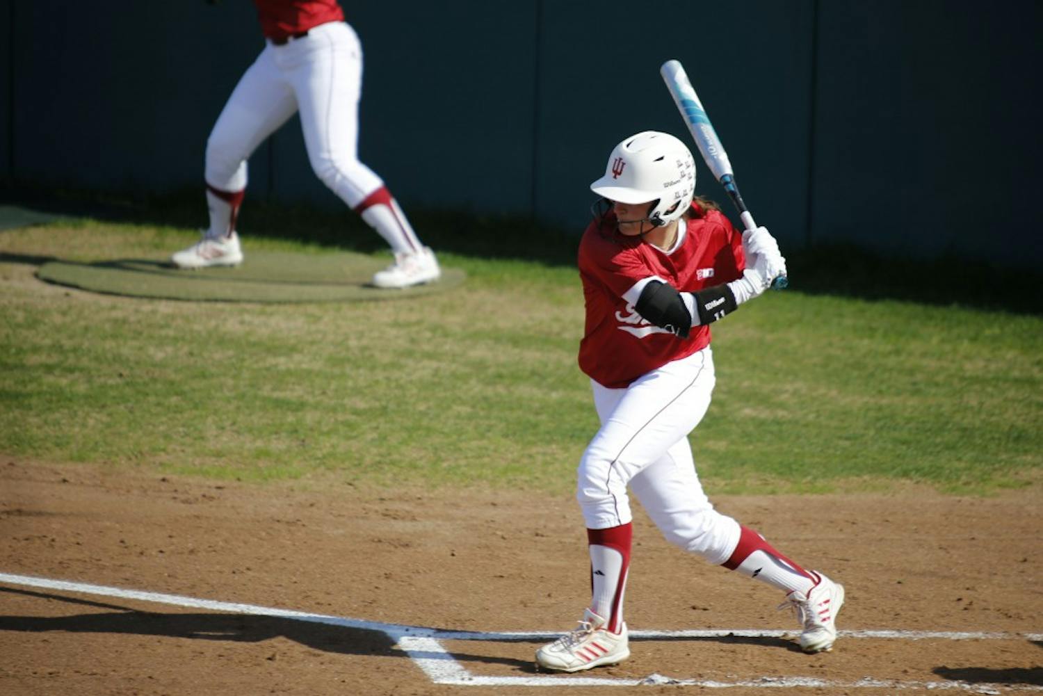 Freshman Outfielder Rebecca Blitz swings her bat during IU's first game against Purdue at the Andy Mohr Field on Apr. 22, 2015. IU won 6-3 after Mena Fulton hit a 3-run home run during the last inning of the game. 