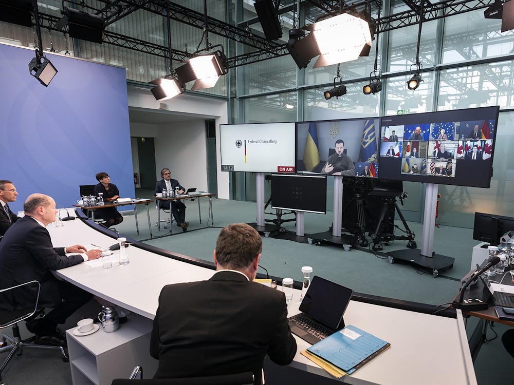 In this handout image provided by German Government Press Office, German Chancellor Olaf Scholz takes part in a video conference with Ukrainian President Volodymyr Zelenskyy and the head of states of G7 on Oct. 11, 2022, in Berlin, Germany.