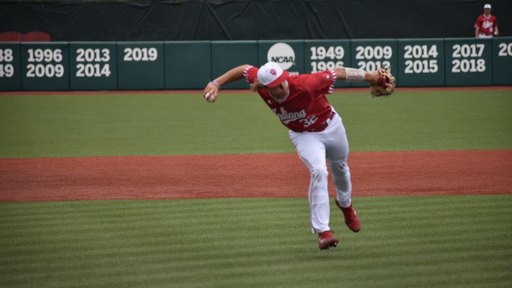 Then-freshman third baseman Josh Pyne throws to first base April 30, 2022, at Bart Kaufman Field. Indiana will face Illinois State University for the final home game of the season Tuesday. 