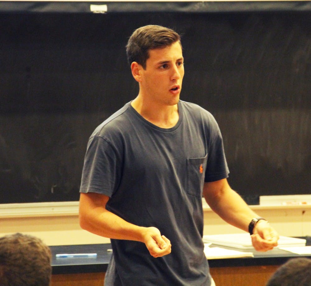 Terry Tossman, the president of College Democrats at IU, talks about the opening position for the College Democrats Wednesday at the Jordan Hall during the callout meeting.