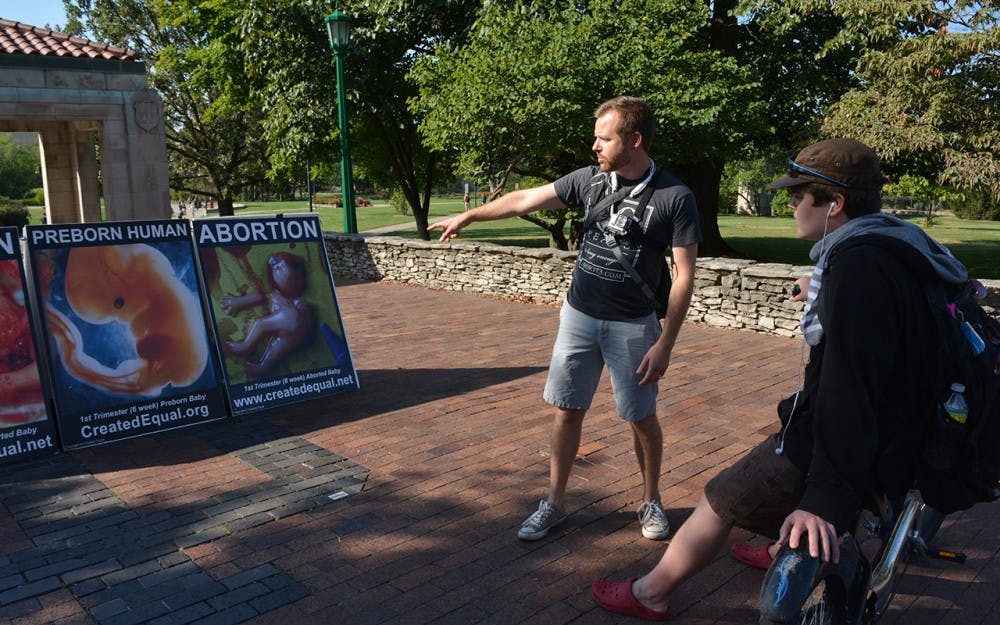Created Equal, an Ohio-based pro-life group, set up signs from 10 a.m. to 2 p.m. Friday outside Hodge Hall to protest abortion. To them, abortion is a form of ageism.