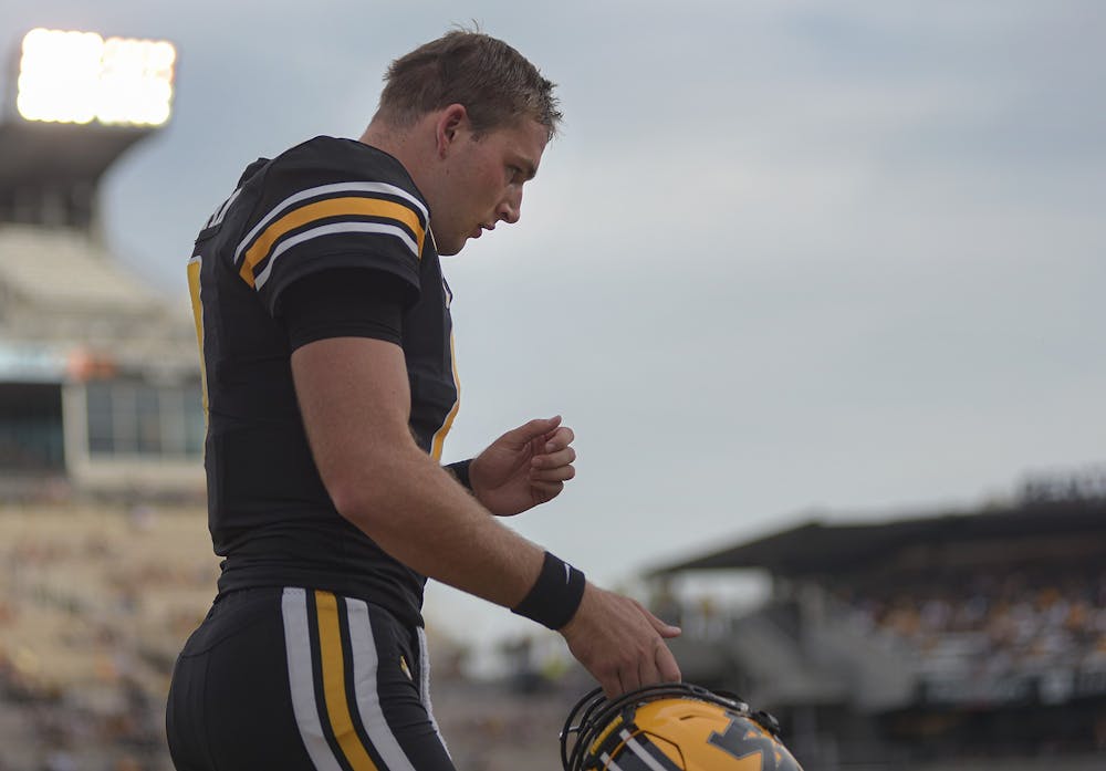 <p>Then-University of Missouri quarterback Connor Bazelak walks to the sideline Oct. 9, 2021, on Faurot Field at Memorial Stadium in Columbia, Missouri. Bazelak, who announced his transfer to Indiana in January, started at quarterback against Illinois on Friday.</p>