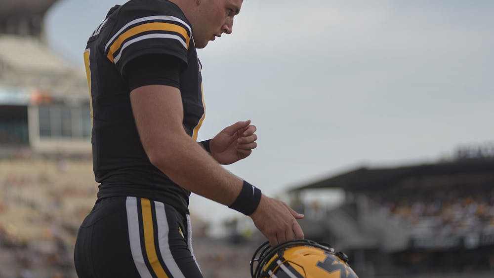 Then-University of Missouri quarterback Connor Bazelak walks to the sideline Oct. 9, 2021, on Faurot Field at Memorial Stadium in Columbia, Missouri. Bazelak, who announced his transfer to Indiana in January, started at quarterback against Illinois on Friday.