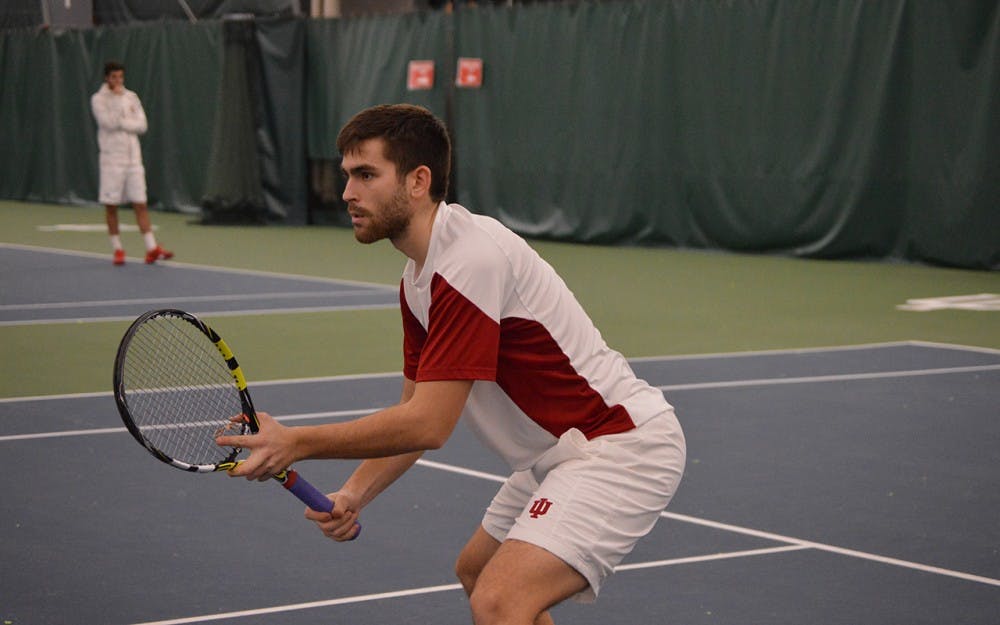 Senior&nbsp;Stefan&nbsp;Lugonjic waits for a Louisville serve during a match Wednesday evening in the IU Tennis Center.&nbsp;