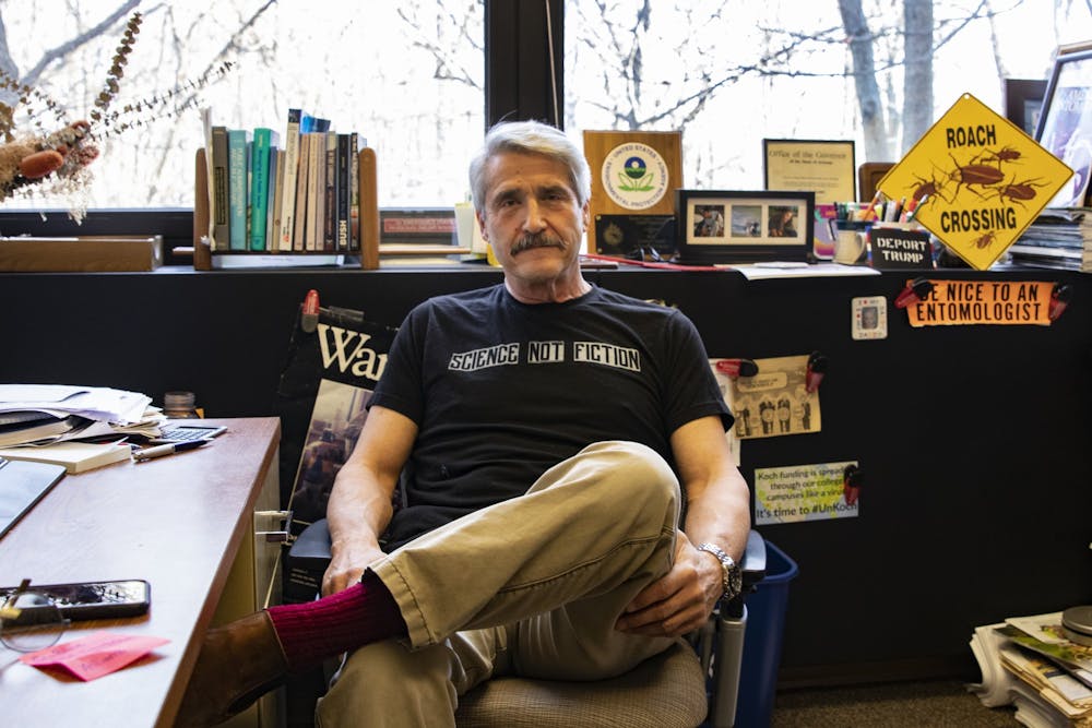<p>Clinical associate professor Marc Lame sits at his desk Jan. 22 in the School of Public and Environmental Affairs. Lame is a 20-year faculty member and holds degrees in agriculture, entomology, and public administration. </p>