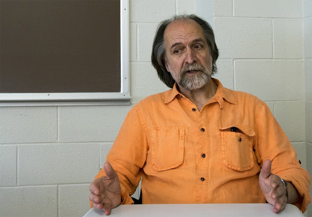 Professor Antonio Vitti asnwers questions Tuesday afternoon in Ballantine Hall. about the Italian Film Festival that starts later this week. Professor Antonio asked to create an Italian film symposium when he accepted his position in IU.  