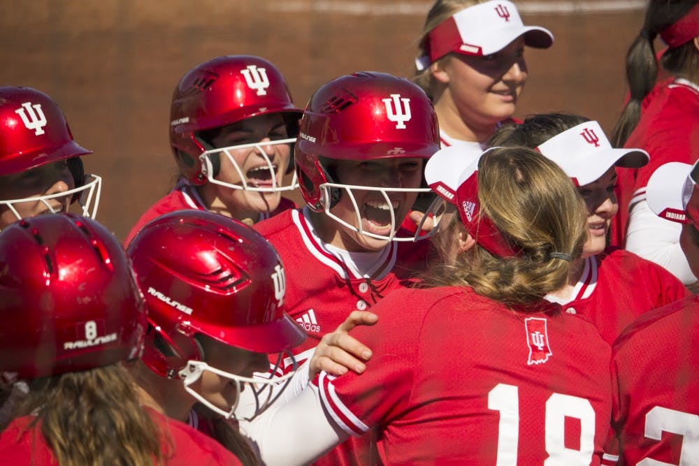 <p>Freshman Maddie Westmoreland celebrates with the team after scoring a home run in the bottom of the third inning against Illinois-Chicago on March 16. Westmoreland was one of six Hoosiers to earn Big Ten awards on Tuesday.</p>