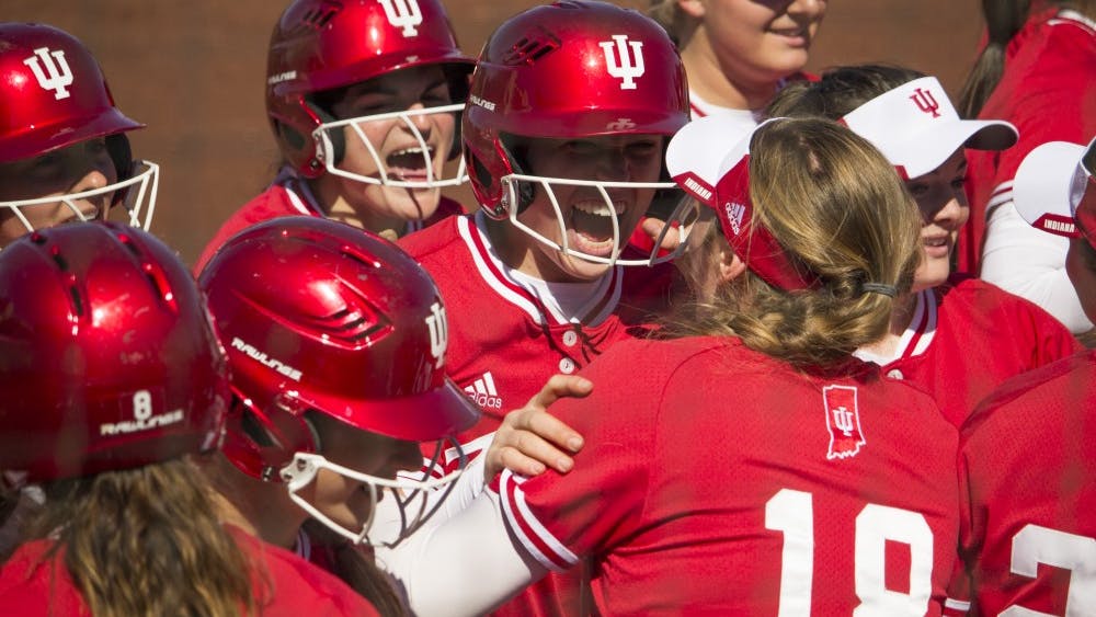 Freshman Maddie Westmoreland celebrates with the team after scoring a home run in the bottom of the third inning against Illinois-Chicago on March 16. Westmoreland was one of six Hoosiers to earn Big Ten awards on Tuesday.