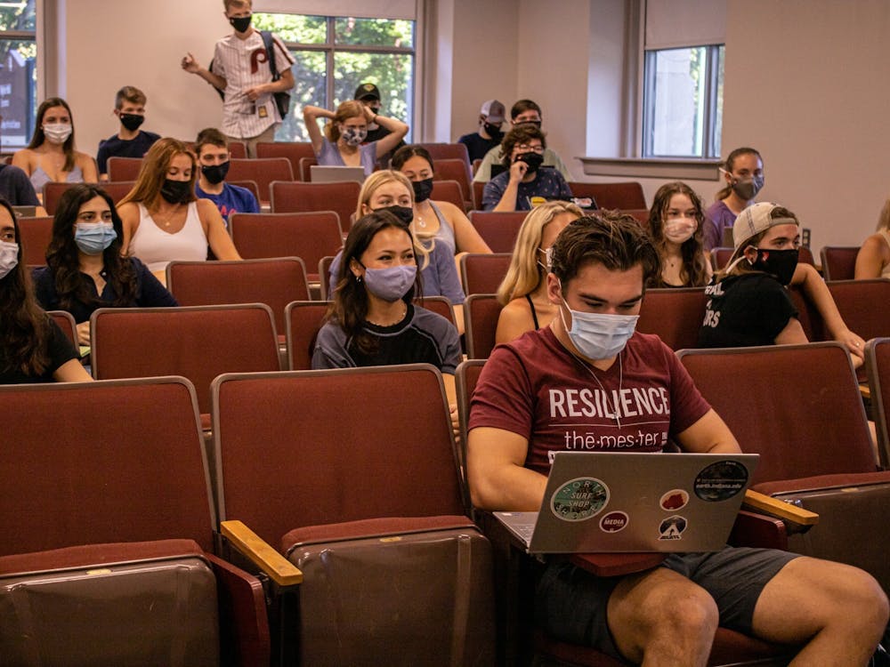 Students wait for the start of their class on Aug. 23, 2021, in Wylie Hall.