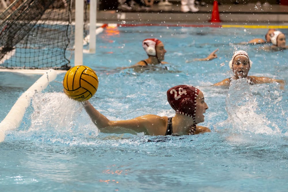Freshman attacker Grace Klingler looks to pass the ball in a game against Stanford March 4, 2023, at the Counsilman-Billingsley Aquatic Center. Indiana plays USC and Whittier this weekend.