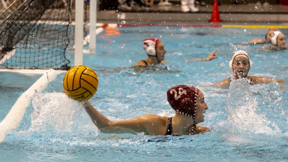Freshman attacker Grace Klingler looks to pass the ball in a game against Stanford March 4, 2023, at the Counsilman-Billingsley Aquatic Center. Indiana plays USC and Whittier this weekend.