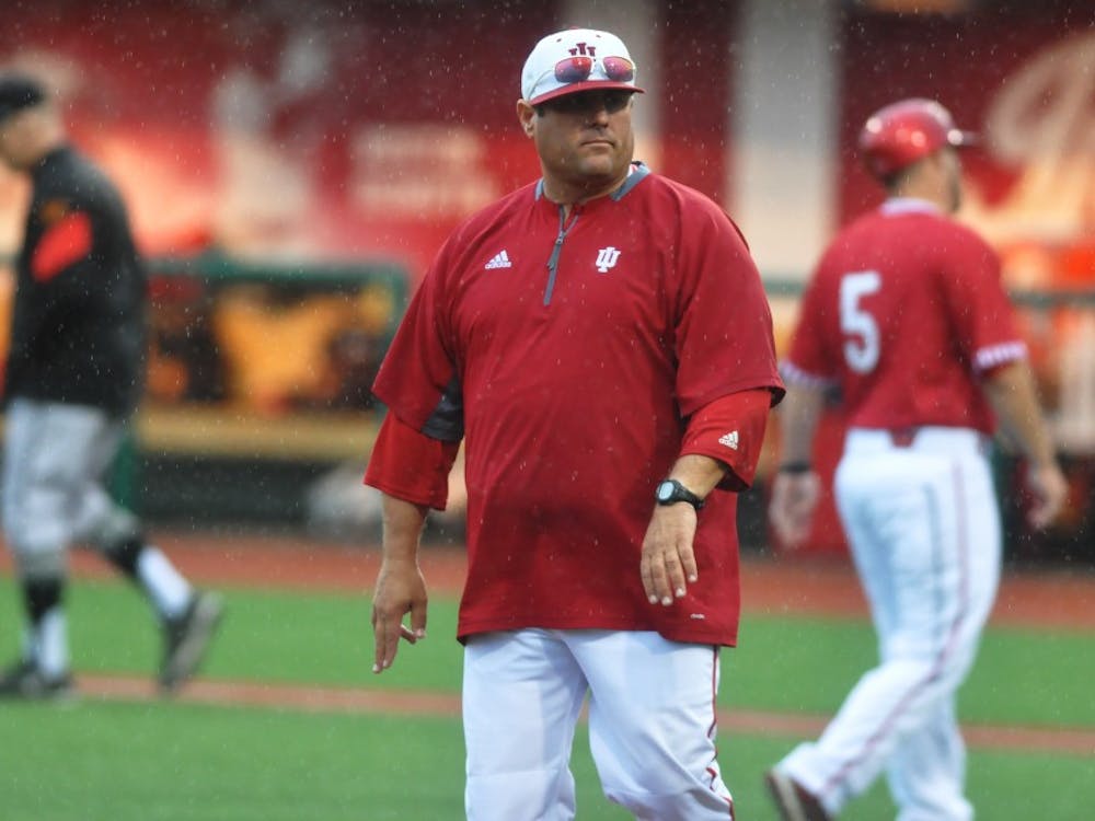 Former IU Coach Chris Lemonis walks off the field after shaking hands with the Maryland coaching staff at Bart Kaufman Field on April 30, 2017. Lemonis is now the head coach at Mississippi State.