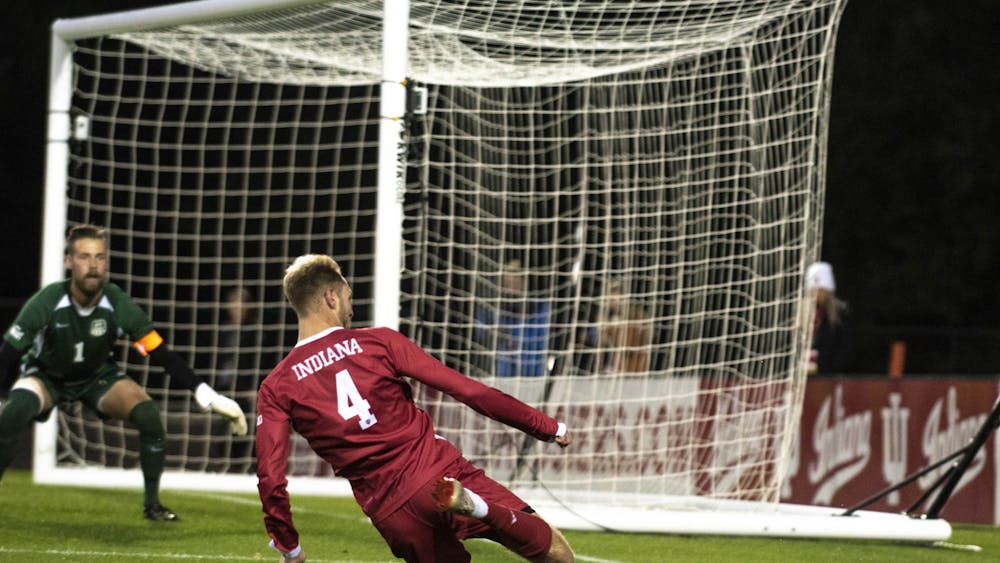 Junior A.J. Palazzolo attempts to save a ball from going out of bounds against the University of Evansville on Oct. 22 at Bill Armstrong Stadium. The IU men’s soccer team earned its second-straight Big Ten Tournament title on Sunday, earning a top five seed in the NCAA Tournament on Monday. 