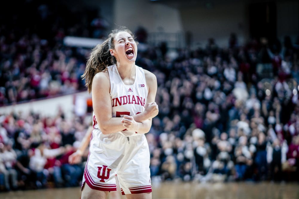Senior forward Mackenzie Holmes celebrates an and-1 Jan. 26, 2023, at Simon Skjodt Assembly Hall in Bloomington, Indiana. Holmes was named Big Ten Defensive Player of the Year on Tuesday.