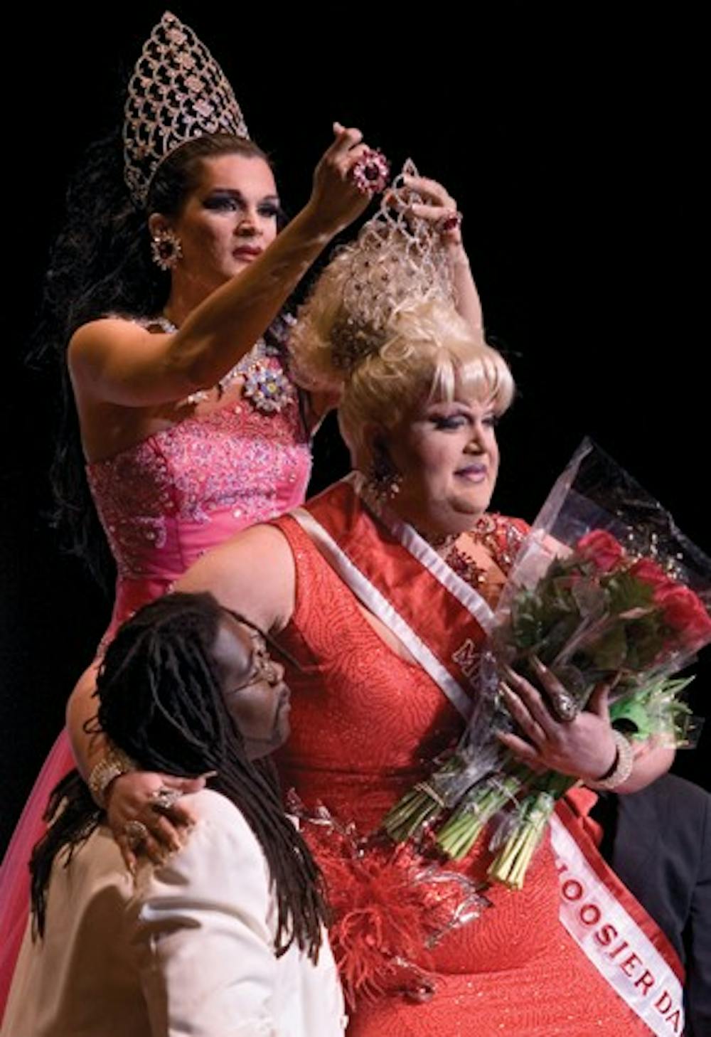 IDS FILE PHOTO
Former Miss Gay IU Vanessa Vale passes the crown to 2007 winner India Black. Black performed a medley of Tina Turner songs for her talent section. Mr. Gay USA Xavier Brooks offered a knee to Black during the coronation.