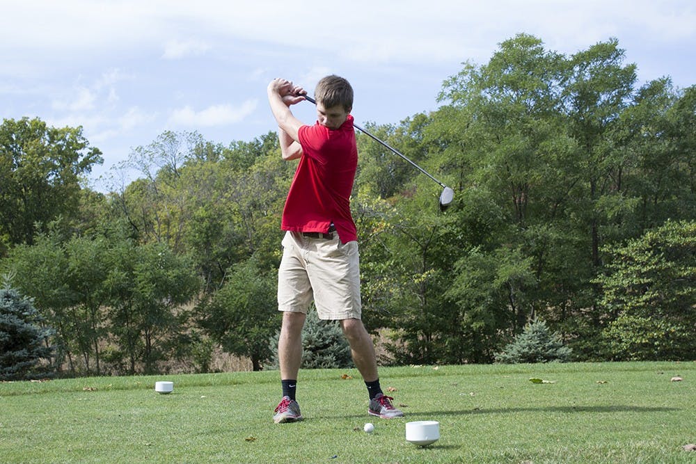 Delta Chi fraternity member Anthony King tees off during the Greek Open Sunday afternoon at the IU Golf Course. The open was apart of the Phi Sigma Kappa philantrophy golf tournament that is a benefit for the Special Olympics.