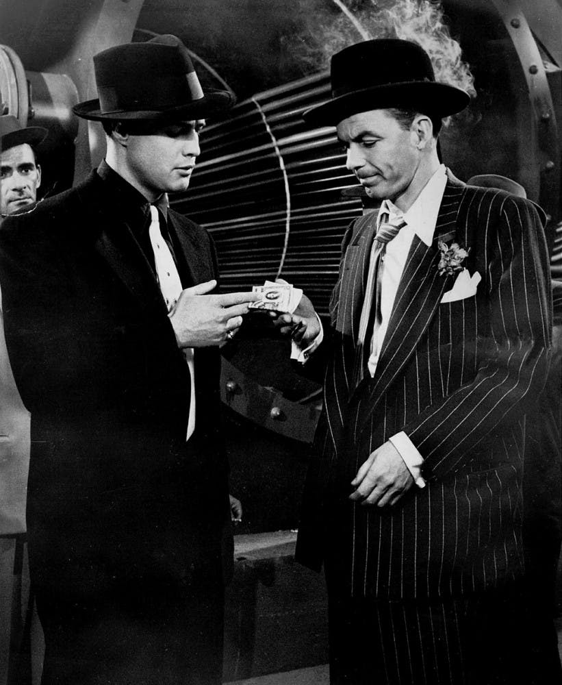 Frank Sinatra (right) and Marlon Brando act in a scene from the 1955 film, "Guys and Dolls." A collection of SInatra's movies will show in a series titled "Sinatra at 100" to celebrate his 100th birthday at IU Cinema.