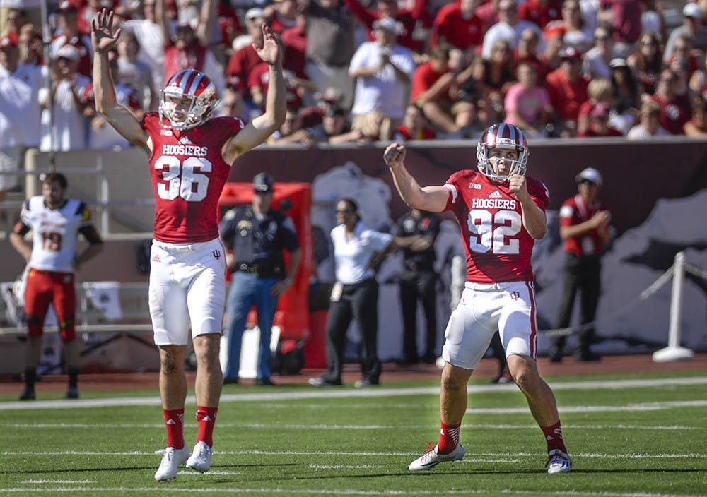 Freshman kicker Griffin Oakes celebrates after kicking a 58-yard field goal against Maryland on Saturday at Memorial Stadium.