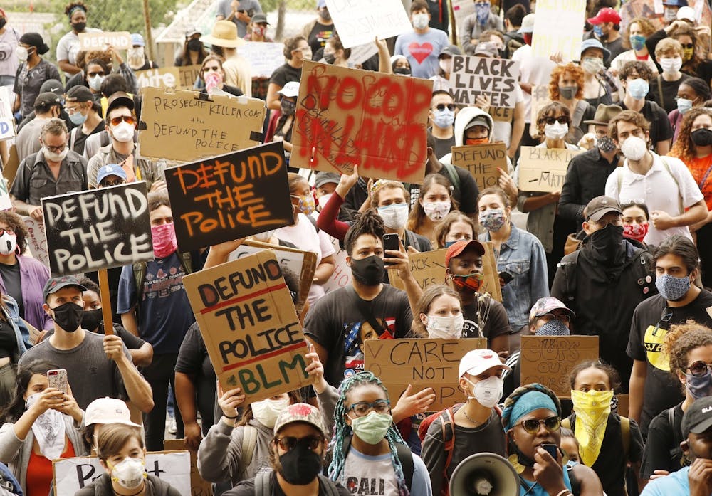 <p>Students and community members march in protest of law enforcement stationed inside schools June 16, 2020, in Los Angeles, California. In response to the video circulating around Twitter, many users voiced their frustrations about the police.</p><p></p>