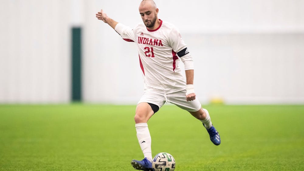 Redshirt senior defender Spencer Glass prepares to kick the ball against Wisconsin on Feb. 19 at Grand Park in Westfield, Indiana. No. 23 Indiana will play Wisconsin on Thursday in Madison, Wisconsin. 
