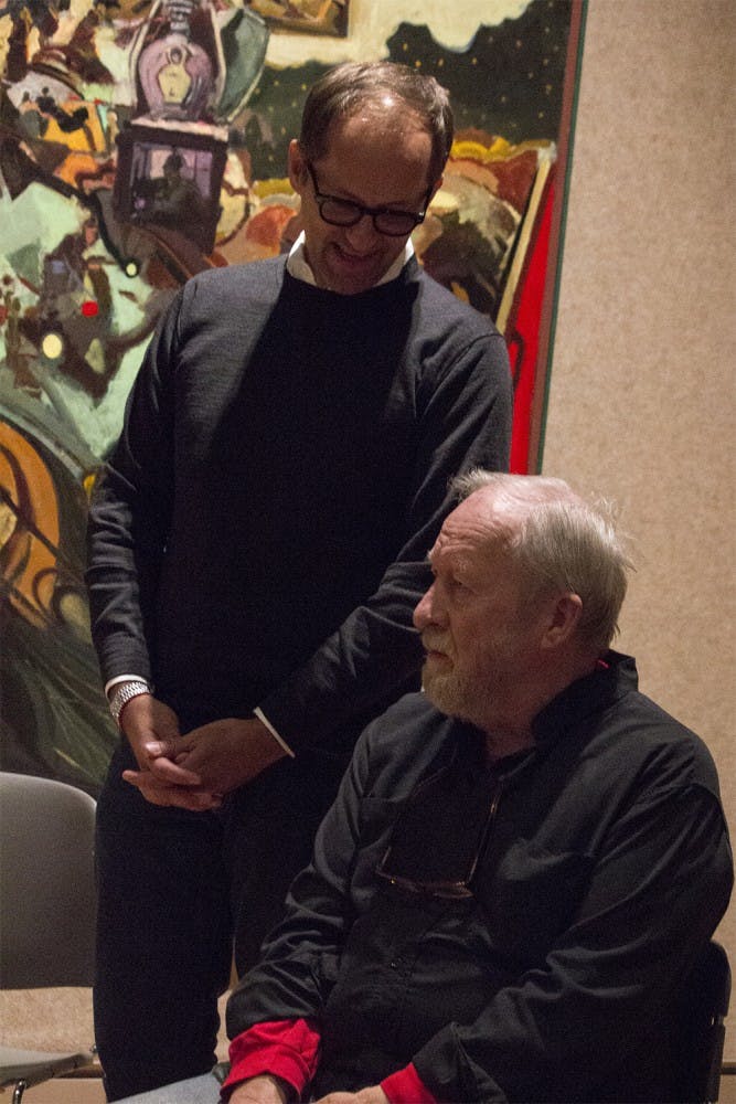 Michael Rooks introduces Robert Barnes during a panel on Saturday at IU Art Museum.  The panel consisted of Brooks and two collectors of his works and was in the middle of the special exhibition, "Grand Allusions: Robert Barnes — Late Works 1985-2015."