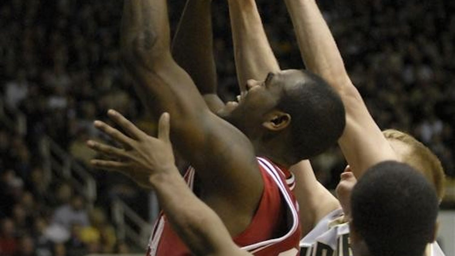 IU's Malik Story leaps for the basket as three Purdue defenders surround him during the first half. IU fell to Purdue 81-67.