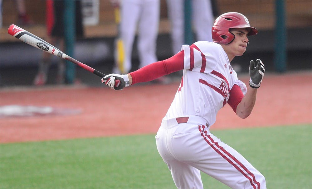 Sophomore Craig Dedelow hits a triple to lead off IU's game against Cincinnati April 8, 2015 at Bart Kaufman Field.