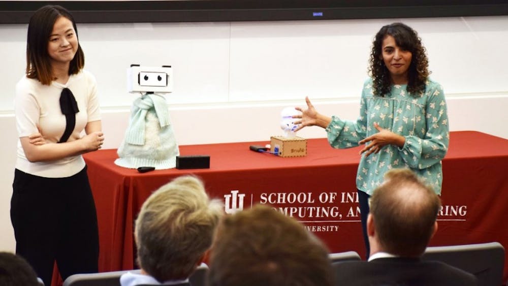 Tingyu Li and Pavithra Ramamurthy pitch their "Buddy" speech therapy robot for children with cleft lip and palate. The team won first prize and $7,500 at the third annual Cheng Wu Innovation Challenge.&nbsp;