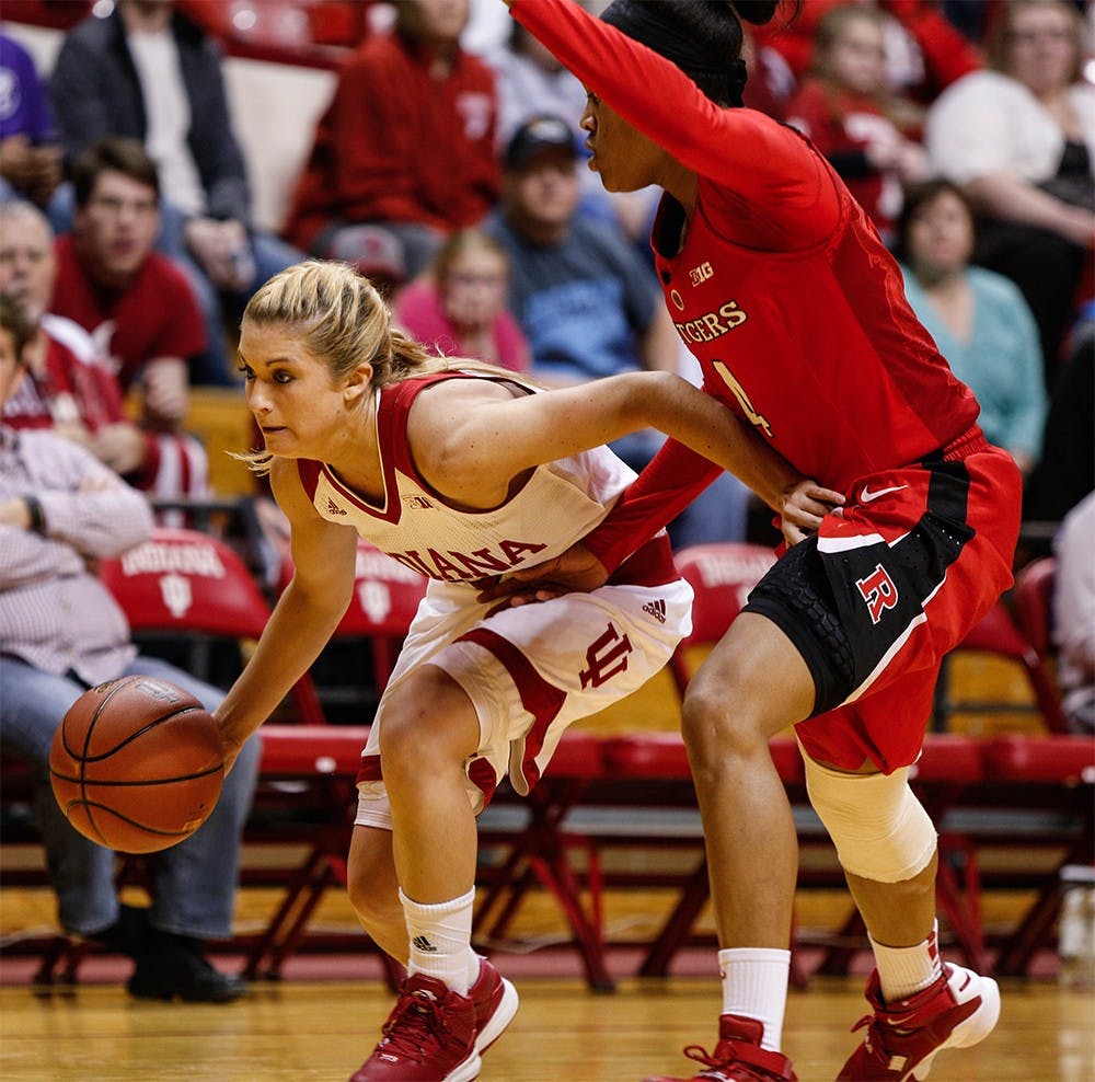 Sophomore guard Tyra Buss dribbles the ball down the court against Rutgers on Wedensday night. Buss led the Hoosiers in scoring with 24 points put up against Rutgers to help IU win 64-48 at Assembly Hall. 