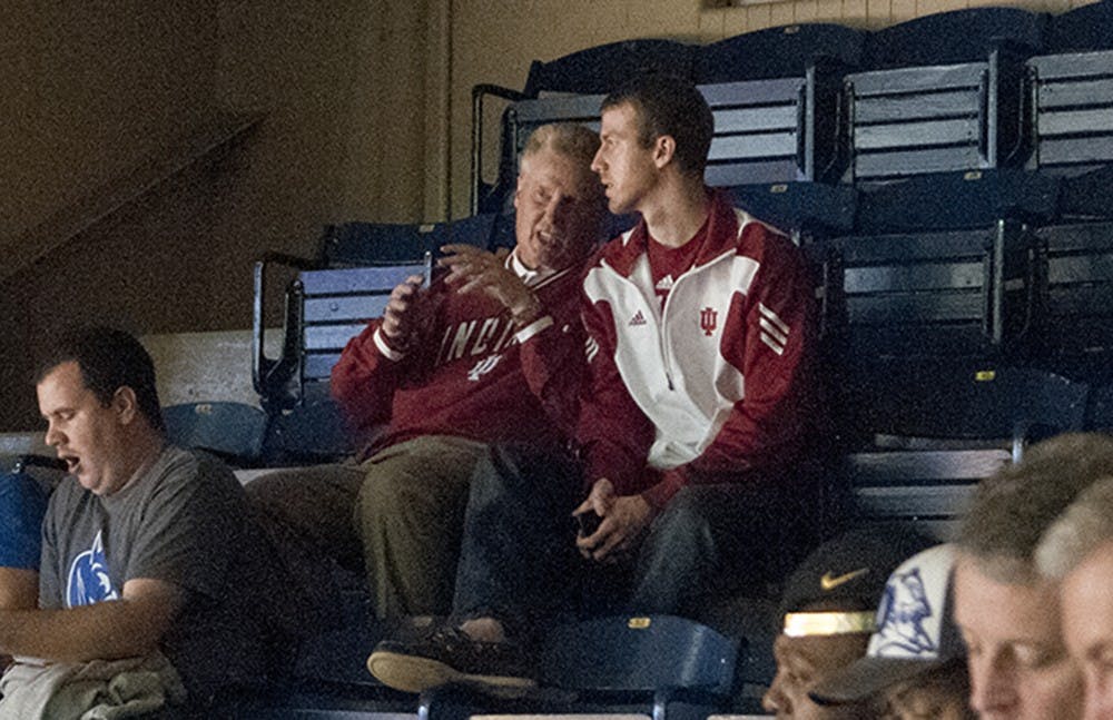 Dan (left) and his son Mark Phebus (right) from Rossville, Ind. chat before the game against Duke on Wednesday at Cameron Indoor Stadium in Durham.
