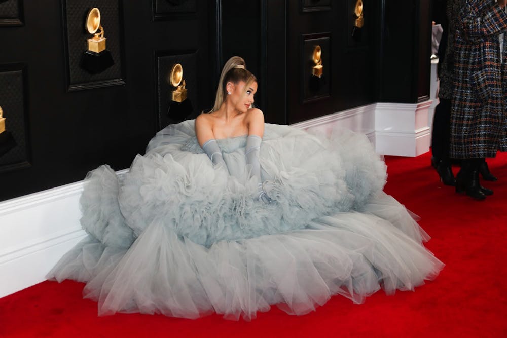 <p>Ariana Grande arrives at the 62nd Grammy Awards at Staples Center on Jan. 26 in Los Angeles. Grande&#x27;s new album, &quot;Positions,&quot; was released Friday.</p>