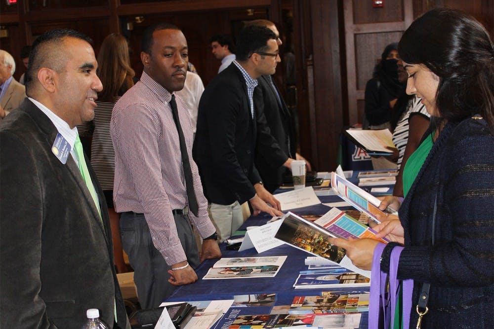 Potential law students meet wih advisors from law schools across the country during the 2014 Law School Fair. This year, the fair will be from 11 a.m. to 3 p.m. on Thursday in Alumni Hall.