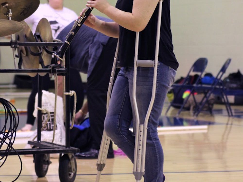 Eighth-grader Marissa Fleenor injured her ankle during marching season and played on crutches from the sidelines. Marissa said she heard people make racist jokes, but for the most part, she said “the town is pretty normal.”