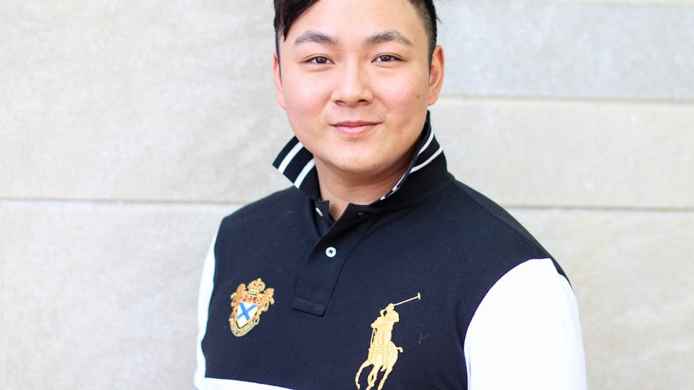 Sean Han, president of the Malaysian Student Association, poses for a portrait May 2 in front of the Indiana Memorial Union. Han has not gone home to Kuala Lumpur, Malaysia, since coming to IU in 2019. 
