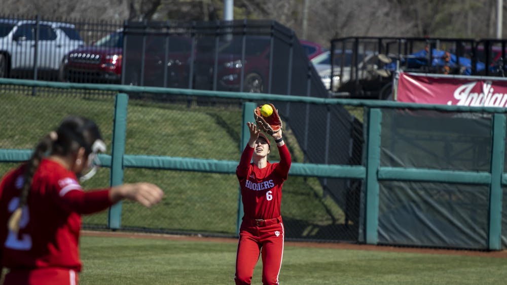 Junior Brooke Benson catches a pop fly March 6, 2023, at Andy Mohr Field. Indiana beat Belmont 10-6 on Tuesday.