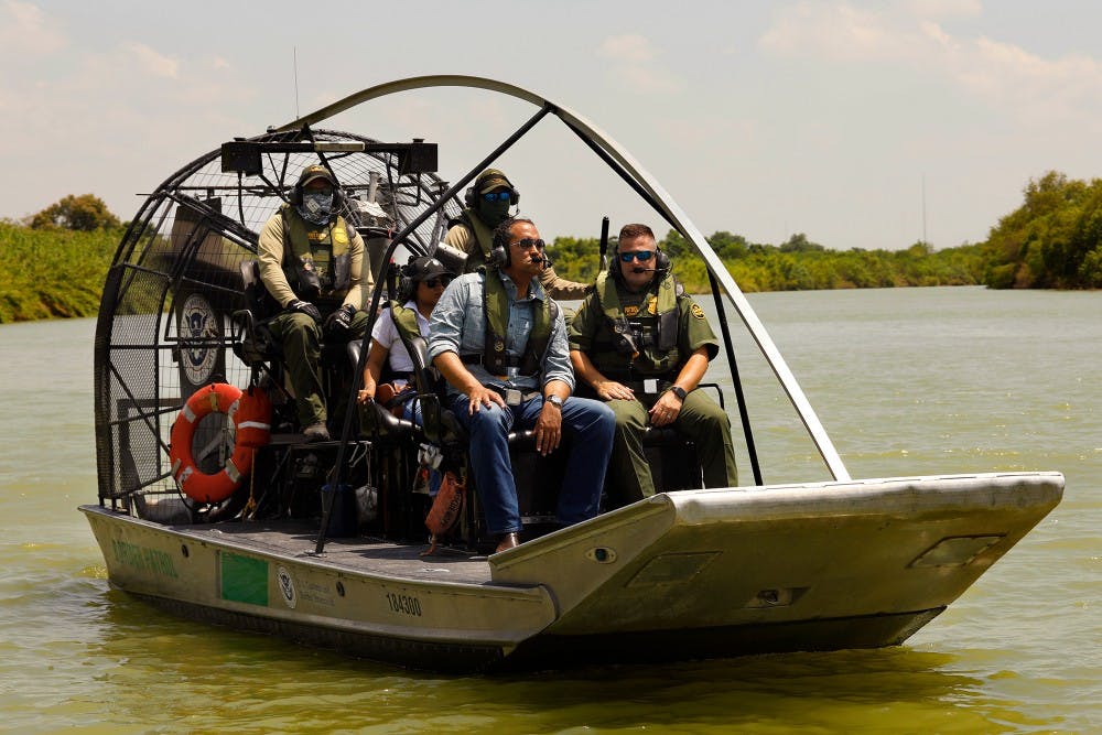 U.S. Rep. Will Hurd, R-Texas, takes a tour of the Rio Grande River in Eagle Pass with Border Patrol Agent in Charge Bryan Kemmett on June 3 in Texas. Hurd represents a district with more than 800 miles of U.S.-Mexico border. 