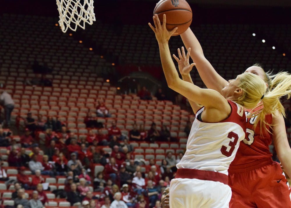 Senior guard Tyra Buss scores against Western Kentucky during Friday's game at Simon Skjodt Assembly Hall. Buss' layup in the final seconds of the game secured IU's win of 73-71.
