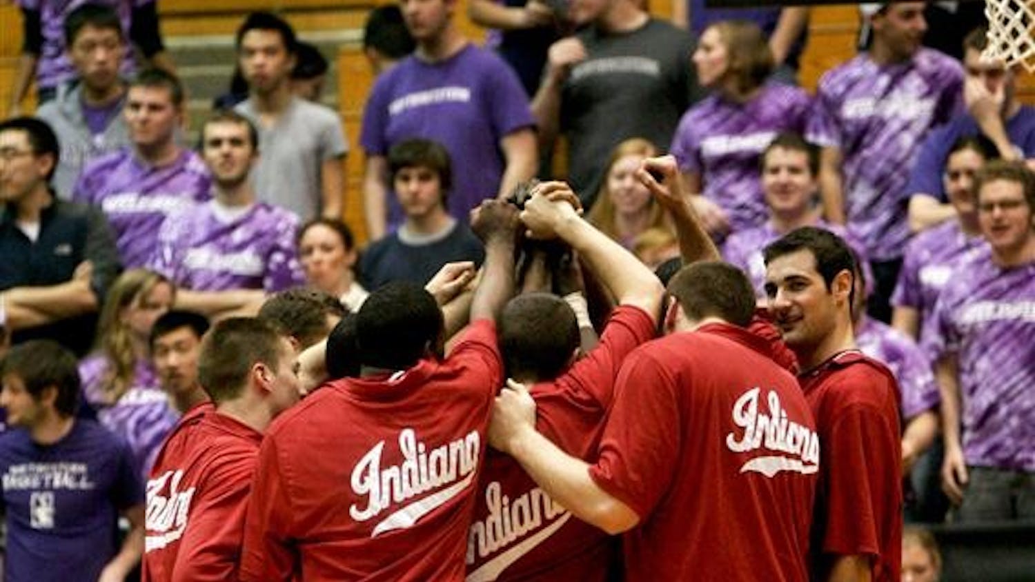 The Hoosiers gather after warmups just before the start of their match with the Northwestern Wildcats in Evanston, Ill.