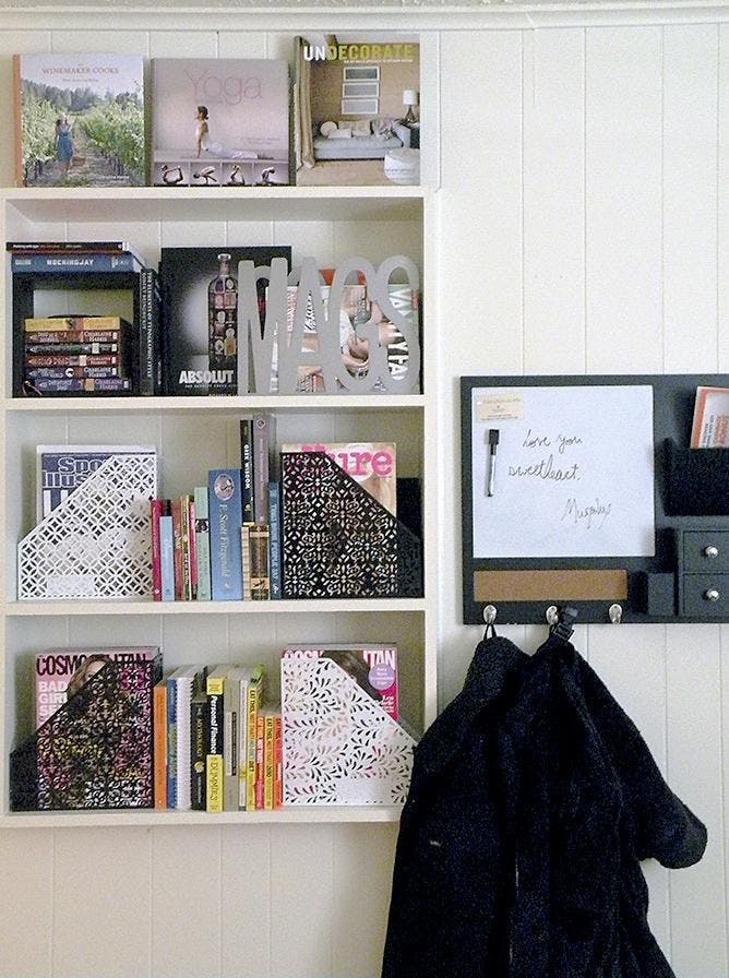 Bookshelf and hooks in doorway