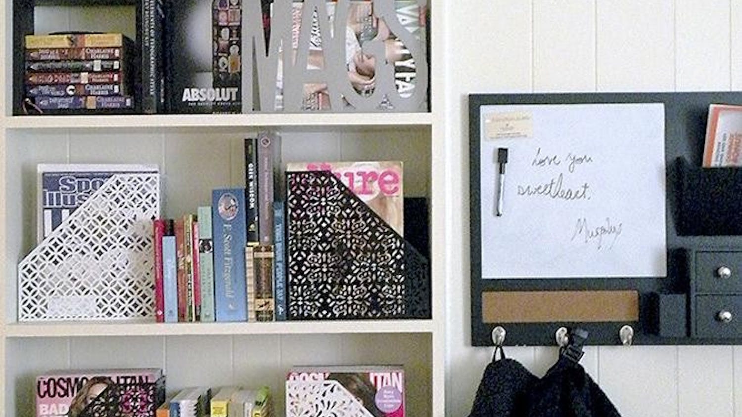 Bookshelf and hooks in doorway
