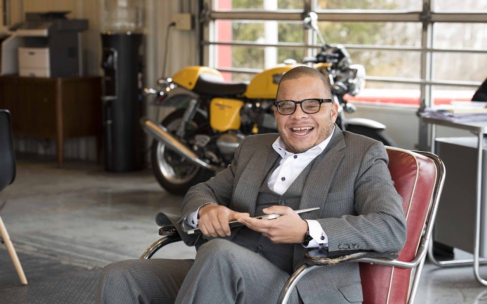 Donald Griffon, Jr. sits in the lobby of his company Griffon Realty Monday afternoon. Griffon, Jr. is the founder of Griffon Realty and was recently awarded the MLK Legacy Award. 