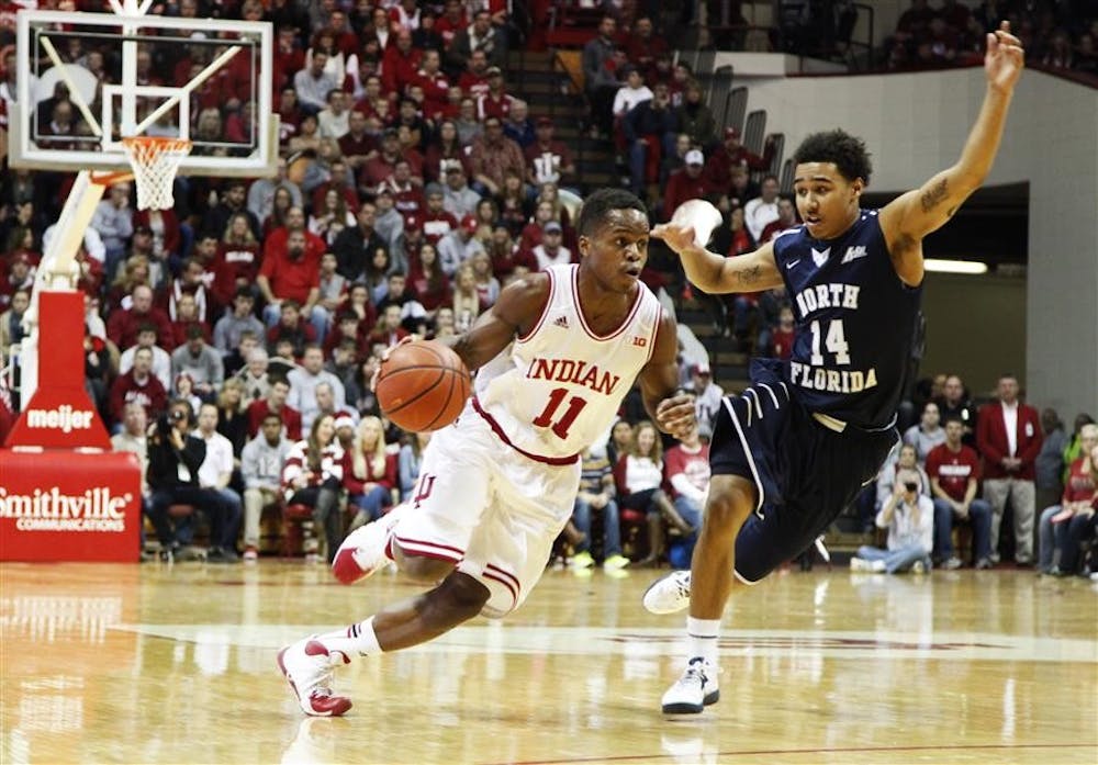 Sophomore guard Kevin "Yogi" Ferrell drives the ball against his North Florida opponent during IU's game Saturday at Assembly Hall. Ferrell finished with 14 points in IU's 89-68 win against North Florida.