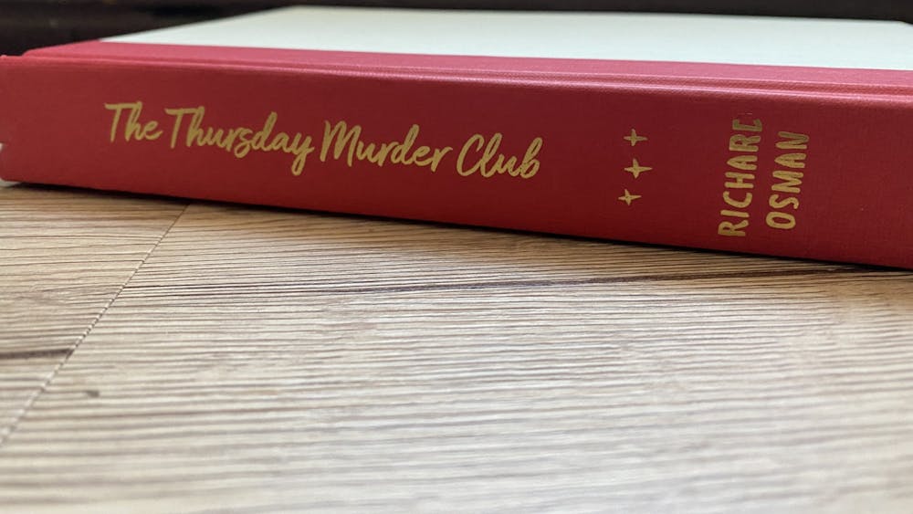 “The Thursday Murder Club” is comedian Richard Osman&#x27;s debut novel. It follows a group of crime-solving senior citizens as they investigate murders related to their retirement village. 